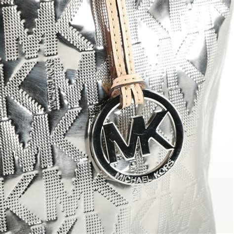 michael kors silver metallic tote|Michael Kors silver crossbody.